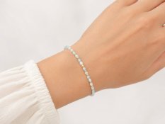 Elegantní zlatý náramek s topazem a zlatými kuličkami 166672